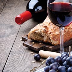 Red wine and grapes